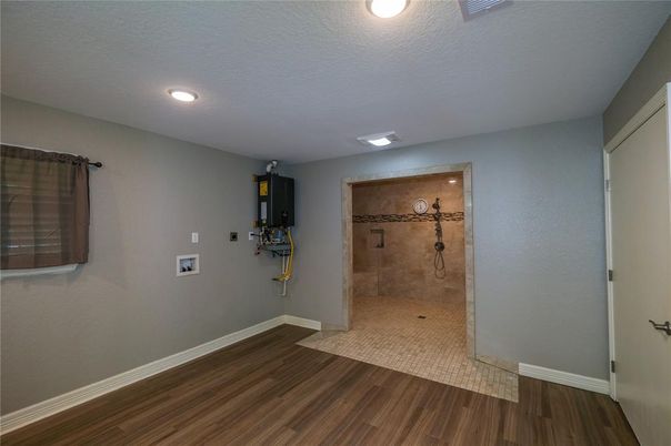 Bathroom, Glass Shower, Interior, Recessed Lighting, Wood Texture Flooring