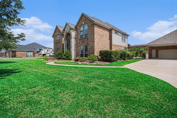 Attached, Backyard, Exterior, Facade, Brick Facade, French Provincial