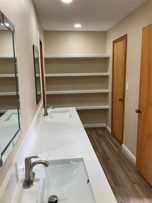 Bathroom, Dual Sink Vanities, Interior, Recessed Lighting, Wood Texture Flooring
