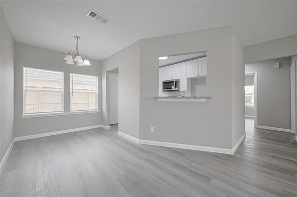Chandelier, Empty room, Interior, Kitchen, Pendant Lights, Stainless Steel Appliances, Wood Texture Flooring