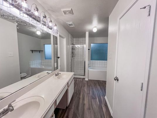 Bathroom, Dual Sink Vanities, Glass Shower, Interior, Wood Texture Flooring