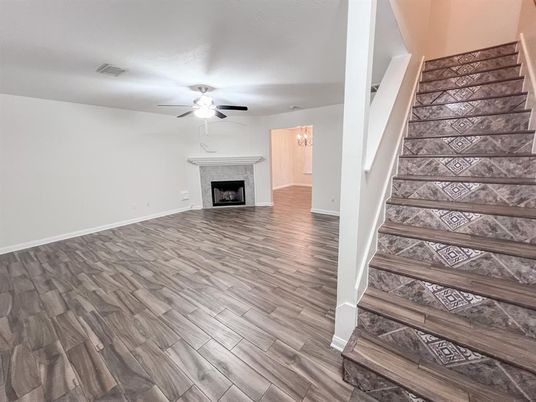 Empty room, Fireplace, Interior, Pendant Lights, Wood Texture Flooring