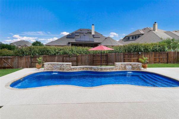 Exterior, Pool, Solar Panels