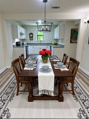 Dining room, Interior, Kitchen, Pendant Lights, Stainless Steel Appliances, Wood Texture Flooring