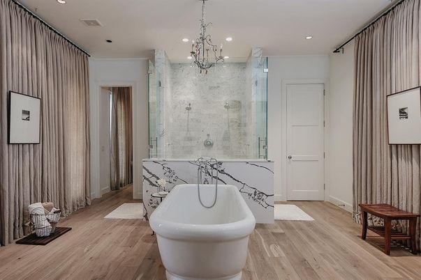 Bathroom, Chandelier, Free Standing Baths, Interior, Marble Walls, Pendant Lights, Recessed Lighting, Wood Texture Flooring