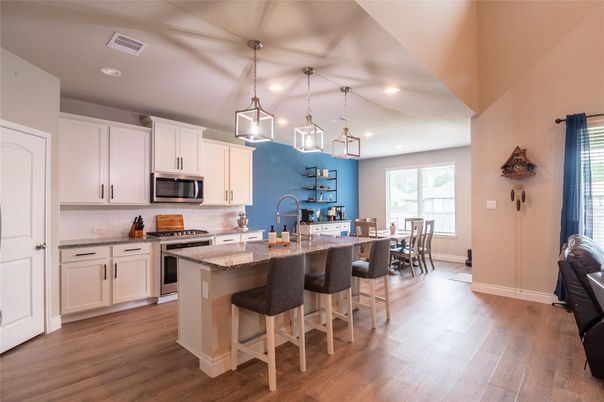 Dining room, Interior, Kitchen, Pendant Lights, Recessed Lighting, Stainless Steel Appliances, Wood Texture Flooring
