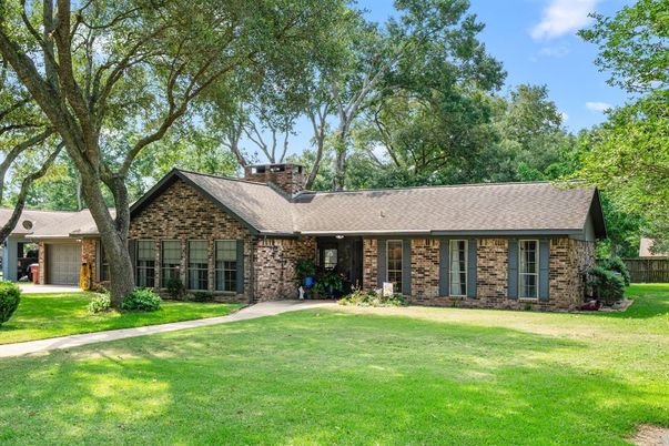 Attached, Backyard, Exterior, Facade, Brick Facade, Ranch