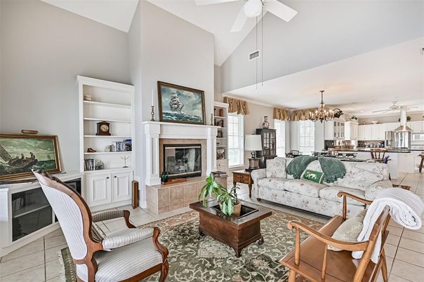 Chandelier, Fireplace, Interior, Kitchen, Living room, Pendant Lights, Recessed Lighting, Stainless Steel Appliances