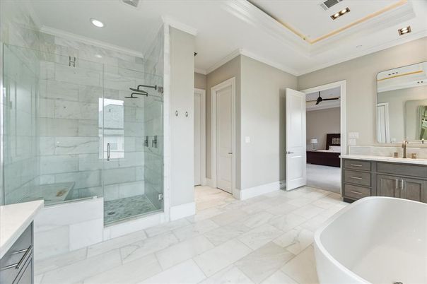 Bathroom, Free Standing Baths, Glass Shower, Interior, Marble, Marble Walls, Recessed Lighting