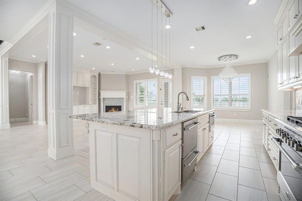Chandelier, Fireplace, Interior, Kitchen, Pendant Lights, Recessed Lighting, Stainless Steel Appliances