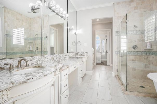 Bathroom, Dual Sink Vanities, Glass Shower, Interior, Recessed Lighting, Stone Walls