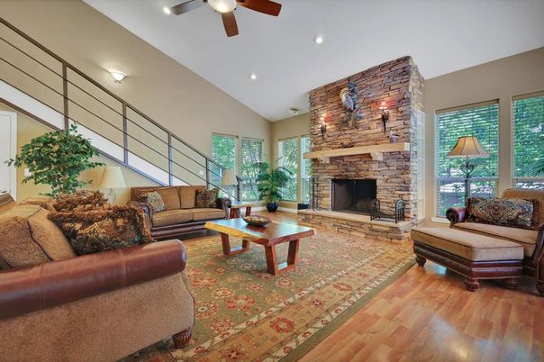 Fireplace, Interior, Living room, Recessed Lighting, Stone Walls, Wood Texture Flooring