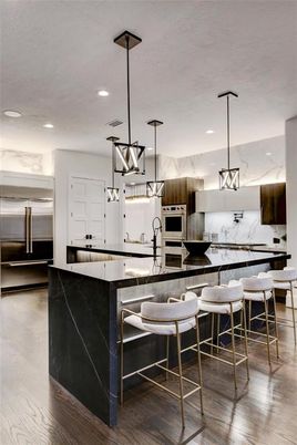 Interior, Kitchen, Marble Walls, Pendant Lights, Recessed Lighting, Stainless Steel Appliances, Wood Texture Flooring