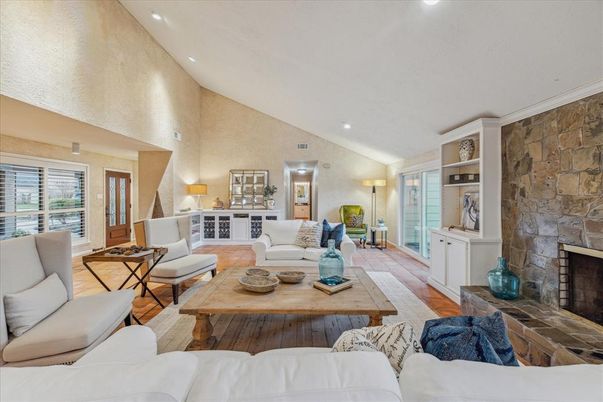 Fireplace, Interior, Living room, Recessed Lighting, Stone Walls, Wood Texture Flooring