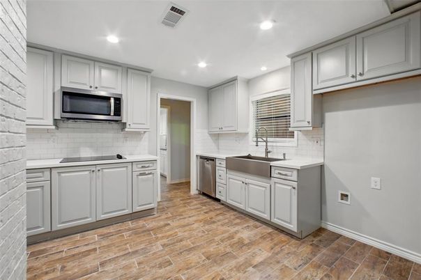 Interior, Kitchen, Recessed Lighting, Stainless Steel Appliances, Wood Texture Flooring