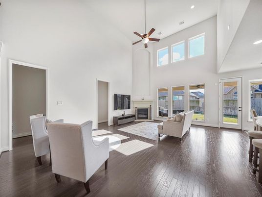 Dining room, Fireplace, Interior, Living room, Recessed Lighting, Wood Texture Flooring