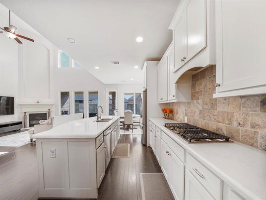 Dining room, Fireplace, Interior, Kitchen, Recessed Lighting, Wood Texture Flooring