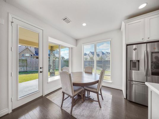 Dining room, Interior, Kitchen, Recessed Lighting, Stainless Steel Appliances, Wood Texture Flooring