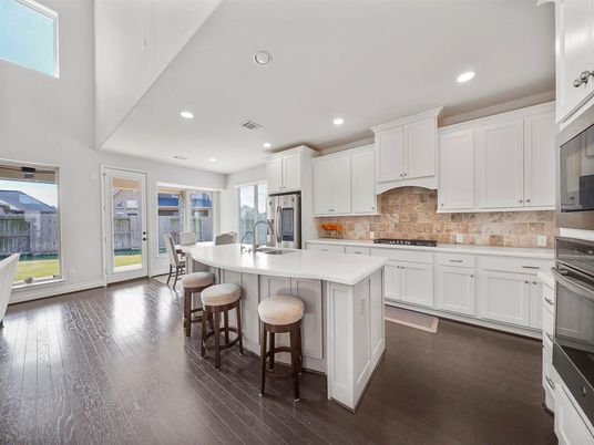 Dining room, Interior, Kitchen, Recessed Lighting, Stainless Steel Appliances, Wood Texture Flooring