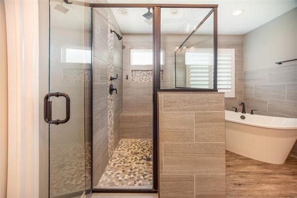 Bathroom, Free Standing Baths, Glass Shower, Interior, Recessed Lighting, Wood Texture Flooring
