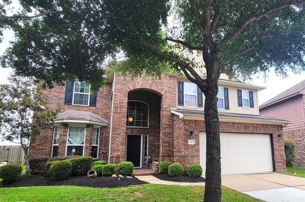 Attached, Exterior, Facade, Brick Facade, Brick Traditional