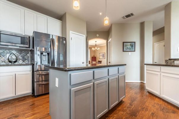 Chandelier, Interior, Kitchen, Pendant Lights, Recessed Lighting, Stainless Steel Appliances, Wood Texture Flooring