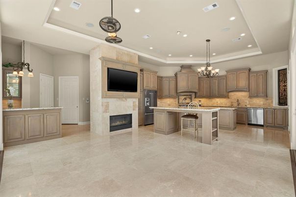 Chandelier, Fireplace, Interior, Kitchen, Pendant Lights, Recessed Lighting, Stainless Steel Appliances