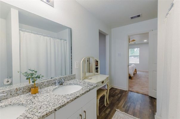 Bathroom, Dual Sink Vanities, Interior, Recessed Lighting, Wood Texture Flooring