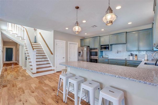 Interior, Kitchen, Pendant Lights, Recessed Lighting, Stainless Steel Appliances, Wood Texture Flooring