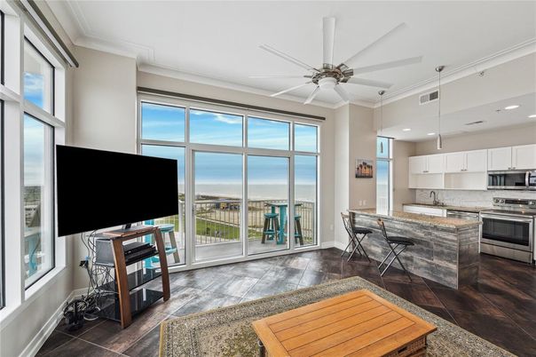 Dining room, Interior, Kitchen, Pendant Lights, Recessed Lighting, Stainless Steel Appliances, Water, Wood Texture Flooring