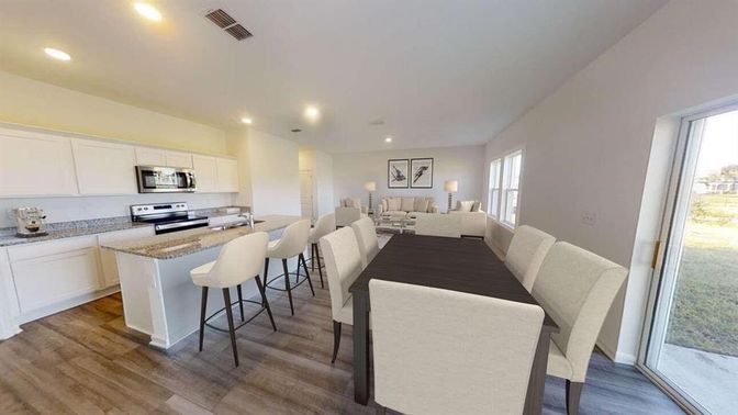 Dining room, Interior, Kitchen, Living room, Recessed Lighting, Stainless Steel Appliances, Wood Texture Flooring