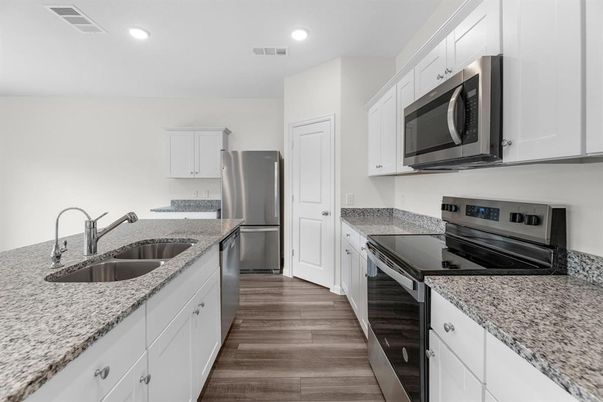 Interior, Kitchen, Recessed Lighting, Stainless Steel Appliances, Wood Texture Flooring