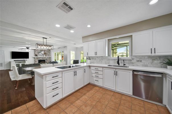 Dining room, Fireplace, Interior, Kitchen, Pendant Lights, Recessed Lighting, Stainless Steel Appliances, Stone Walls