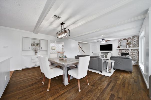 Dining room, Fireplace, Interior, Living room, Pendant Lights, Stone Walls, Wood Texture Flooring