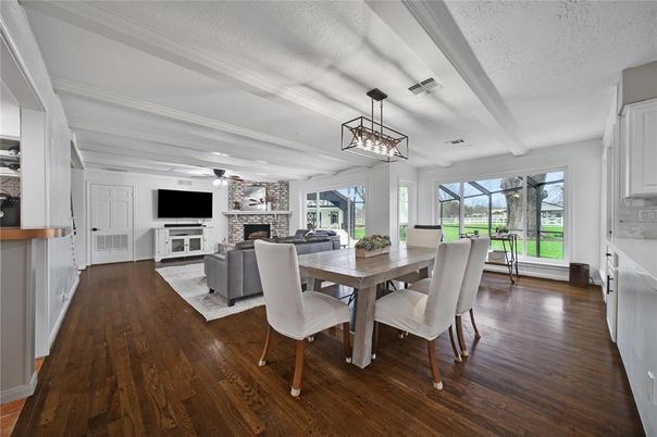 Dining room, Fireplace, Interior, Living room, Pendant Lights, Wood Texture Flooring