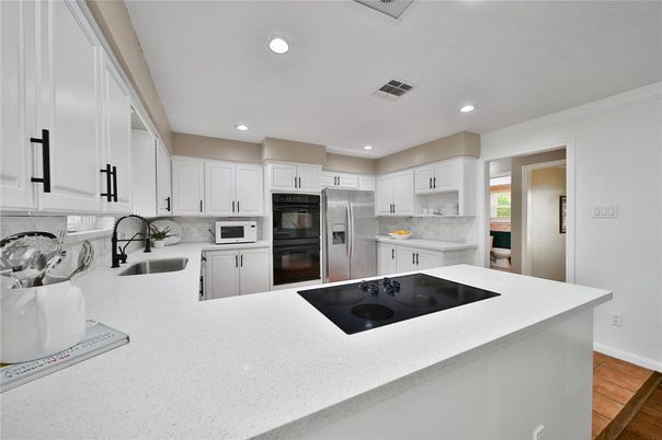 Interior, Kitchen, Recessed Lighting, Stainless Steel Appliances, Wood Texture Flooring