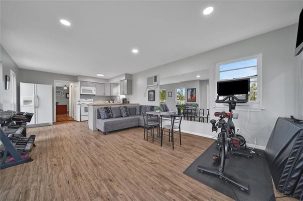 Dining room, Fitness Equipment, Interior, Kitchen, Recessed Lighting, Wood Texture Flooring