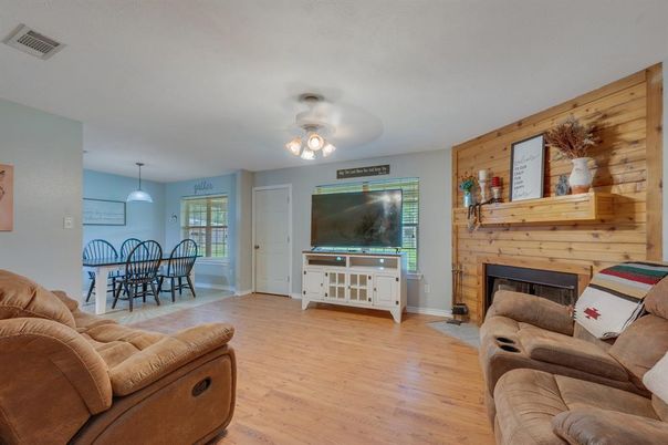 Dining room, Fireplace, Interior, Living room, Pendant Lights, Wood Texture Flooring, Wooden Walls