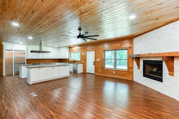 Empty room, Fireplace, Interior, Kitchen, Recessed Lighting, Wooden Ceilings, Wood Texture Flooring, Wooden Walls