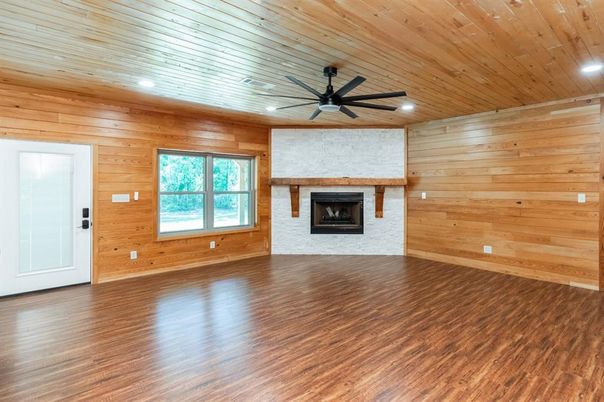 Empty room, Fireplace, Interior, Recessed Lighting, Wooden Ceilings, Wood Texture Flooring, Wooden Walls