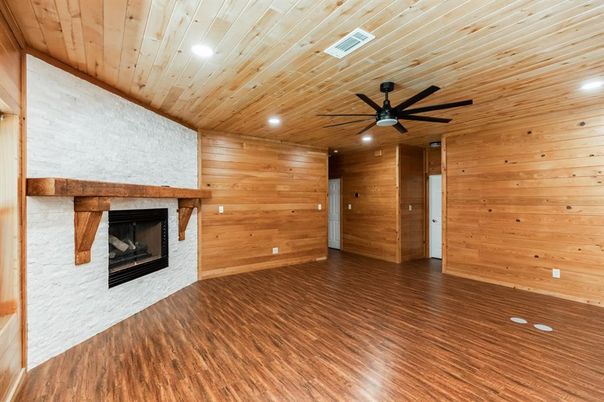 Empty room, Fireplace, Interior, Recessed Lighting, Wooden Ceilings, Wood Texture Flooring, Wooden Walls