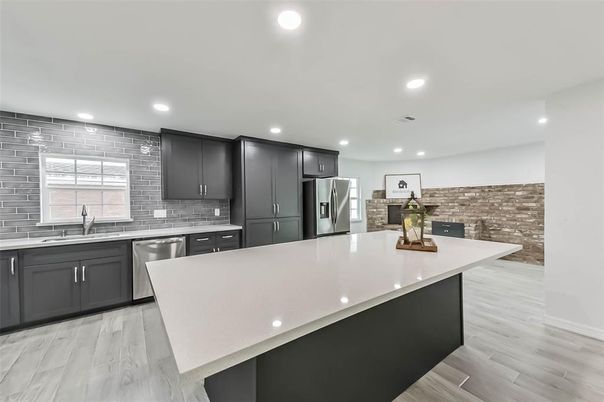 Interior, Kitchen, Recessed Lighting, Stainless Steel Appliances, Stone Walls, Wood Texture Flooring