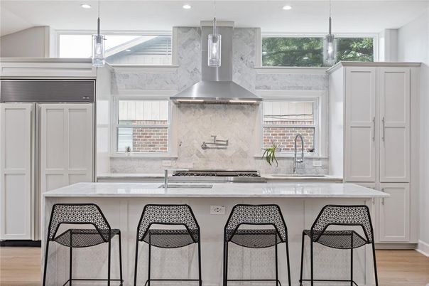 Interior, Kitchen, Marble Walls, Pendant Lights, Recessed Lighting, Stainless Steel Appliances, Wood Texture Flooring
