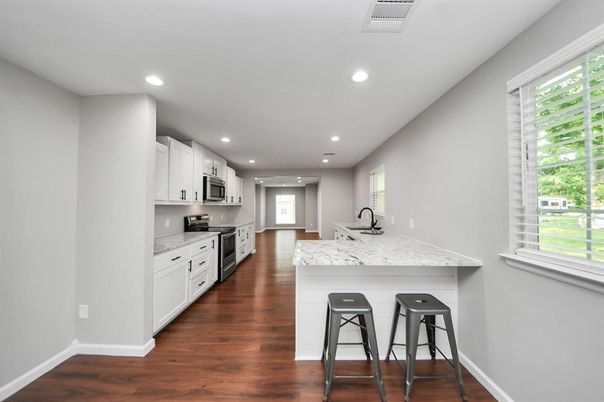 Interior, Kitchen, Recessed Lighting, Stainless Steel Appliances, Wood Texture Flooring
