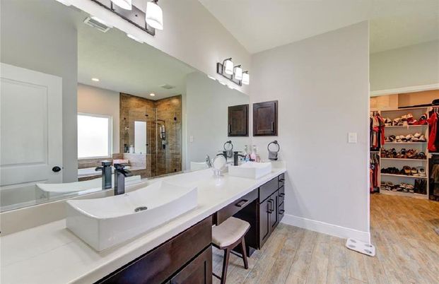 Bathroom, Dual Sink Vanities, Glass Shower, Interior, Recessed Lighting, Wood Texture Flooring
