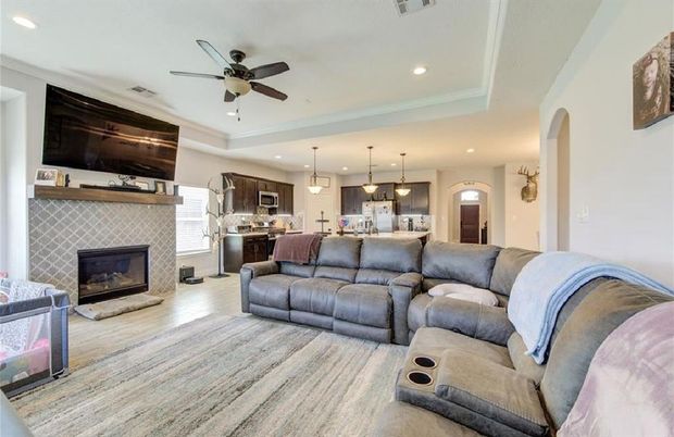 Fireplace, Interior, Kitchen, Living room, Pendant Lights, Recessed Lighting, Stainless Steel Appliances, Wood Texture Flooring