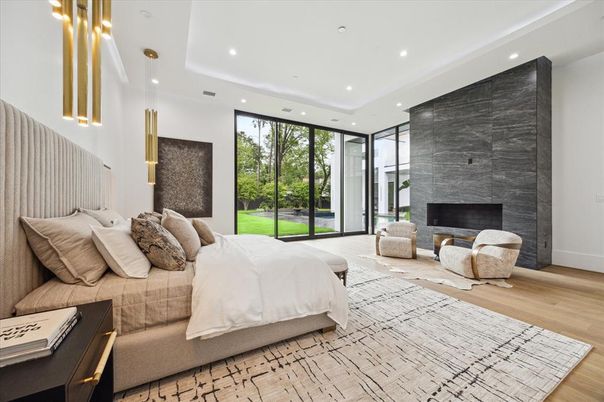Bedroom, Fireplace, Interior, Pendant Lights, Recessed Lighting, Wood Texture Flooring