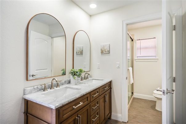 Bathroom, Dual Sink Vanities, Interior, Recessed Lighting, Wood Texture Flooring