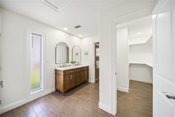 Bathroom, Dual Sink Vanities, Interior, Recessed Lighting, Wood Texture Flooring