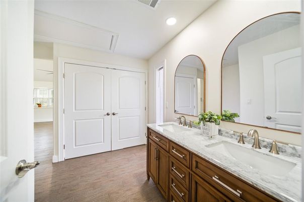 Bathroom, Dual Sink Vanities, Interior, Recessed Lighting, Wood Texture Flooring